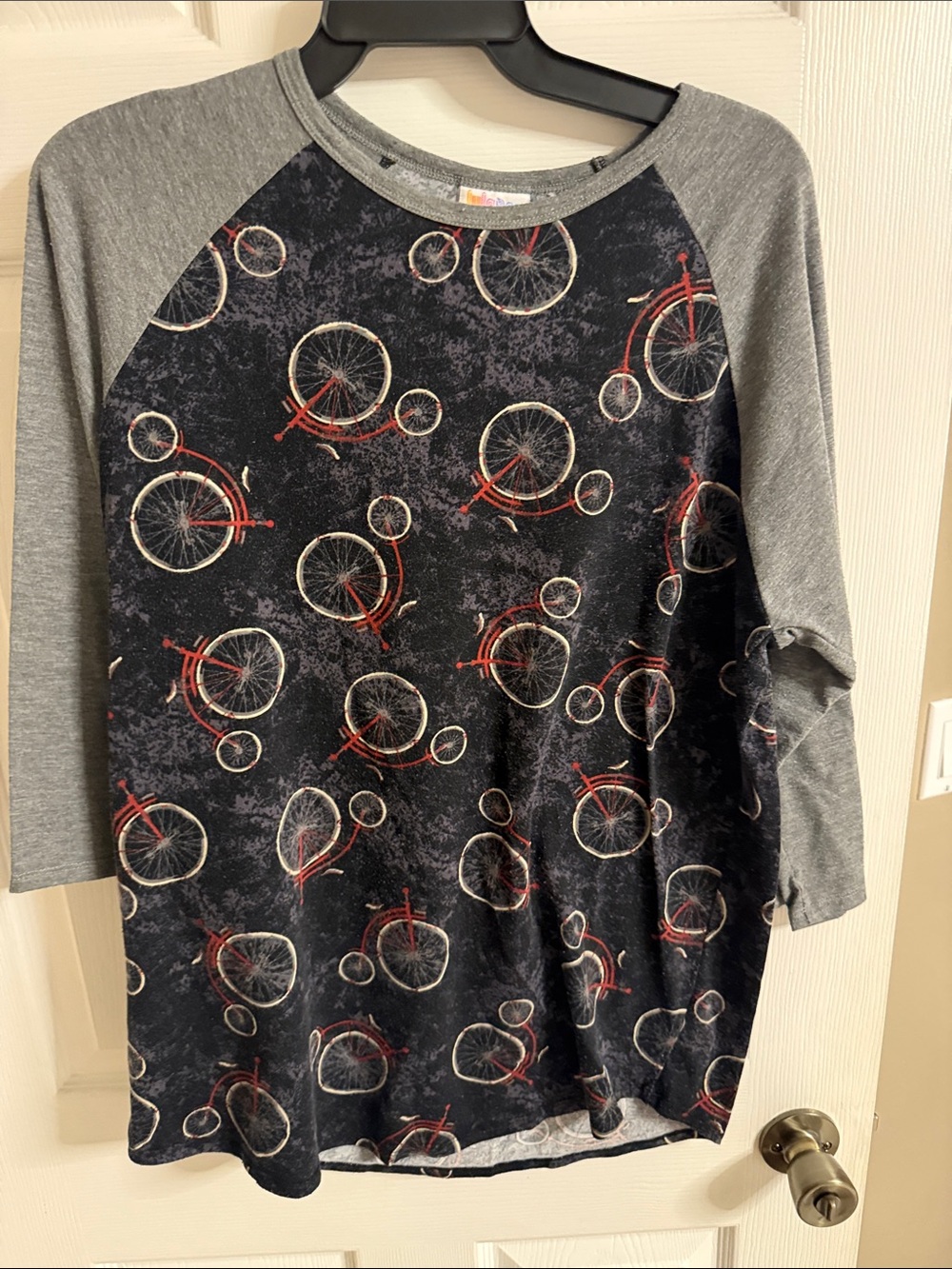 LuLaRoe Black and Gray Raglan Top with Red Bicycle Print